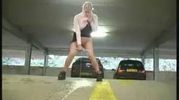 The girl pisses in the underground parking